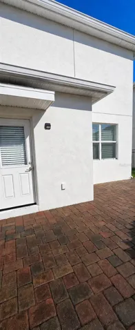Back Door to paver courtyard in backyard