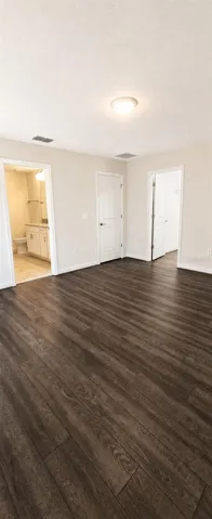 Master bedroom features walk in closet & en suite bath with walk in shower  a garden tub