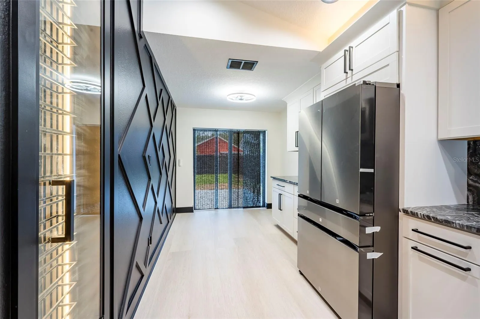 Wine Closet with Wood Trim Design