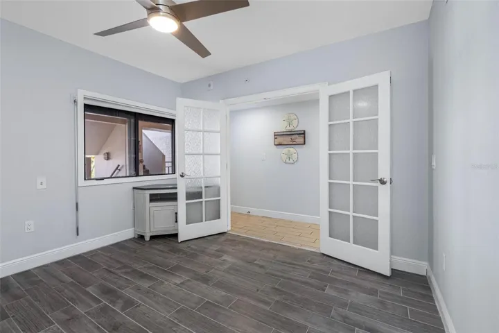 .. Guest Bedroom #2 Located on Main Level. Electric Storm Shutters - New Plank Tile Floors.