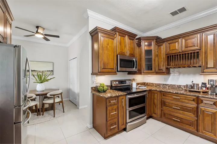 Elegant chef's kitchen with a bright and inviting eat-in area.