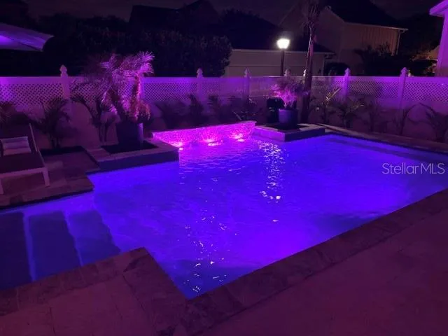 Heated salt water pool fully fenced
