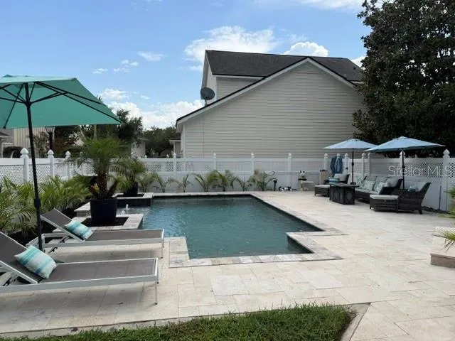 Heated salt water pool fully fenced