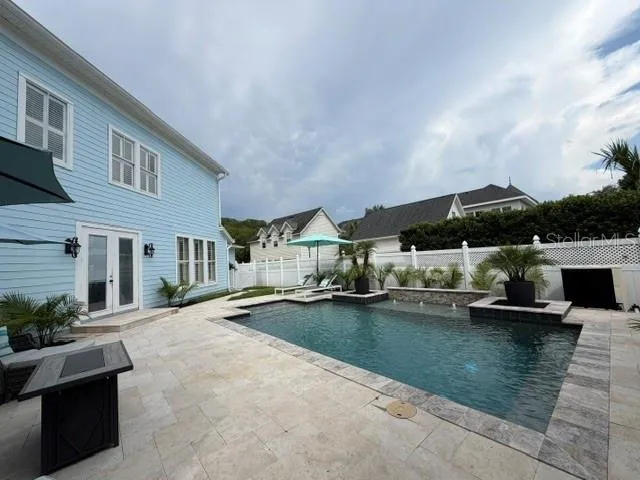 Heated salt water pool fully fenced
