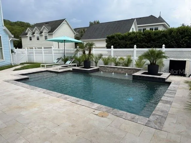 Heated salt water pool fully fenced