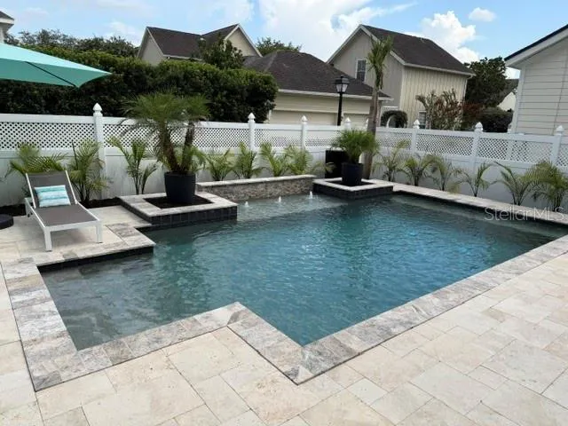 Heated salt water pool fully fenced