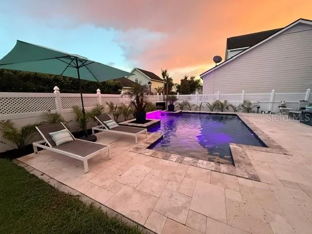 Heated salt water pool fully fenced