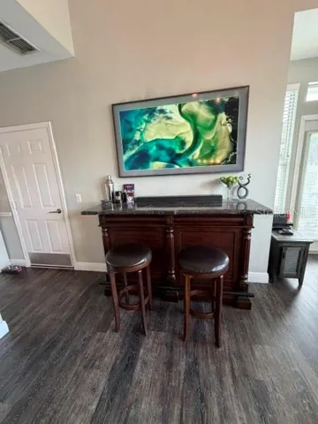 Family Room with Bar and Art TV