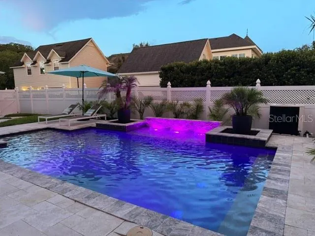 Heated salt water pool fully fenced