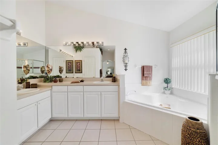 En suite with garden tub and dual sinks