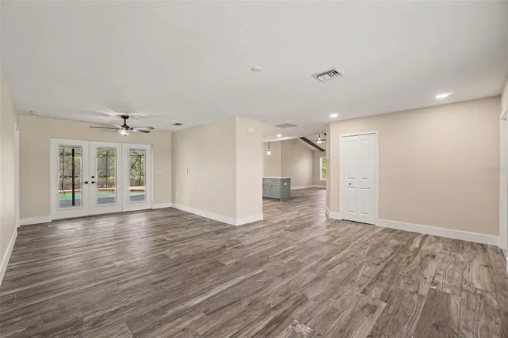 Alternate view of dining room and living room.