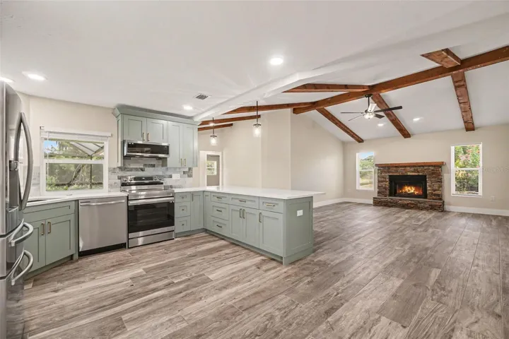 View of family room and kitchen