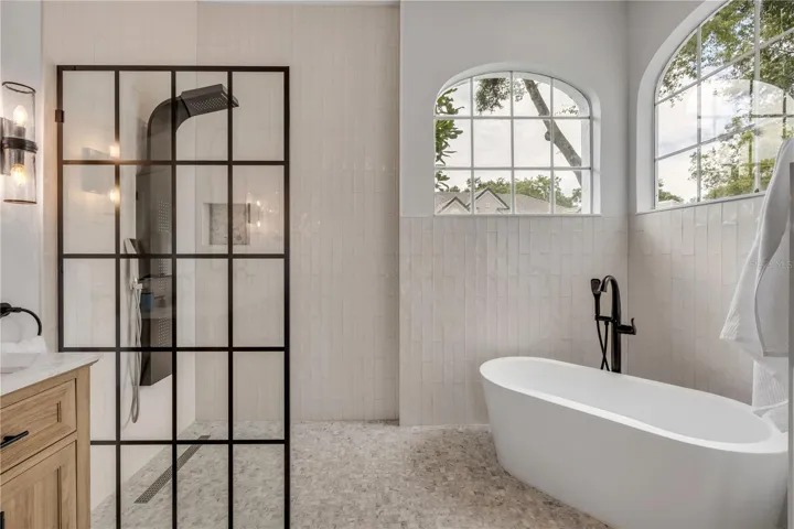 Primary bath with walk in shower and separate soaking tub