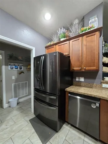 Fridge and Kitchen Area