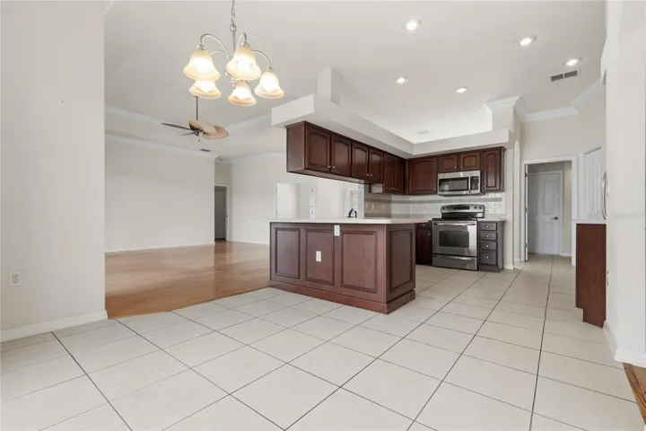 DINING ROOM WITH VIEW OF KITCHEN