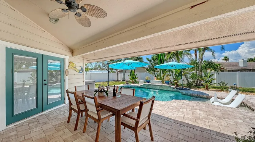 Covered lanai and large deck area.