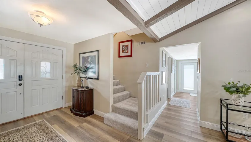 Hallway to kitchen, side yard and laundry room.