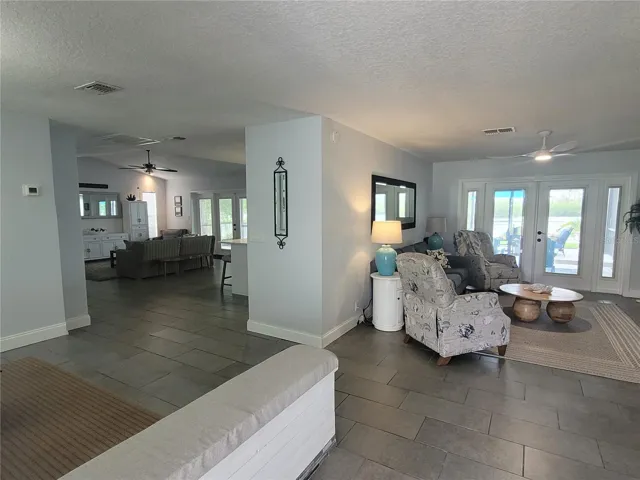 Front Door view to Family Room and Living Room