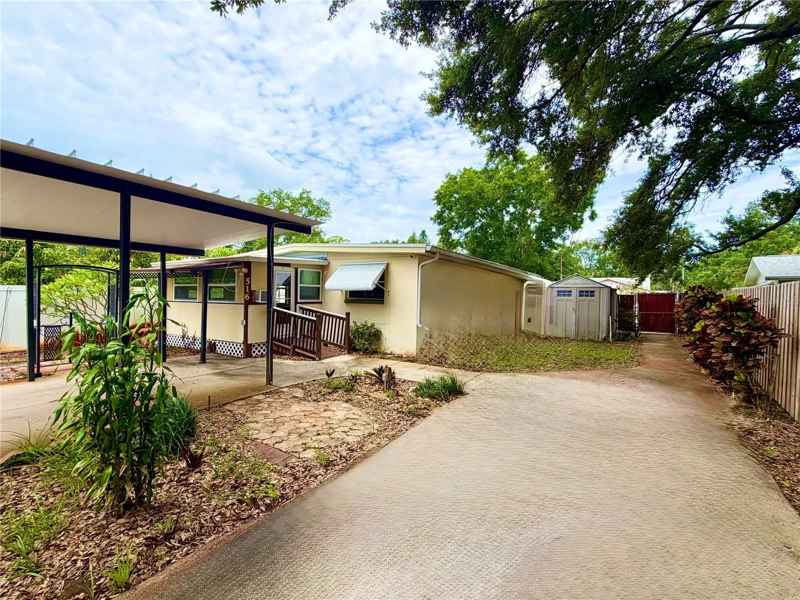 Carport, shed, and patio
