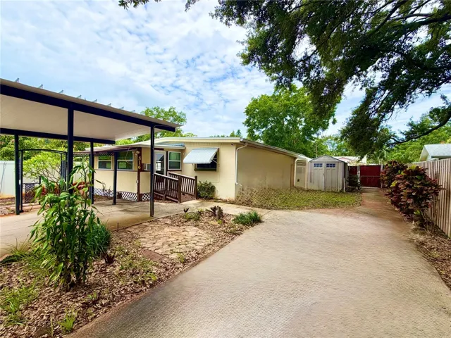 Carport, shed, and patio