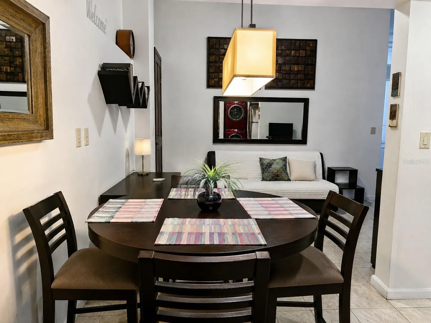 Dining area overlooking the spacious open-concept living room.