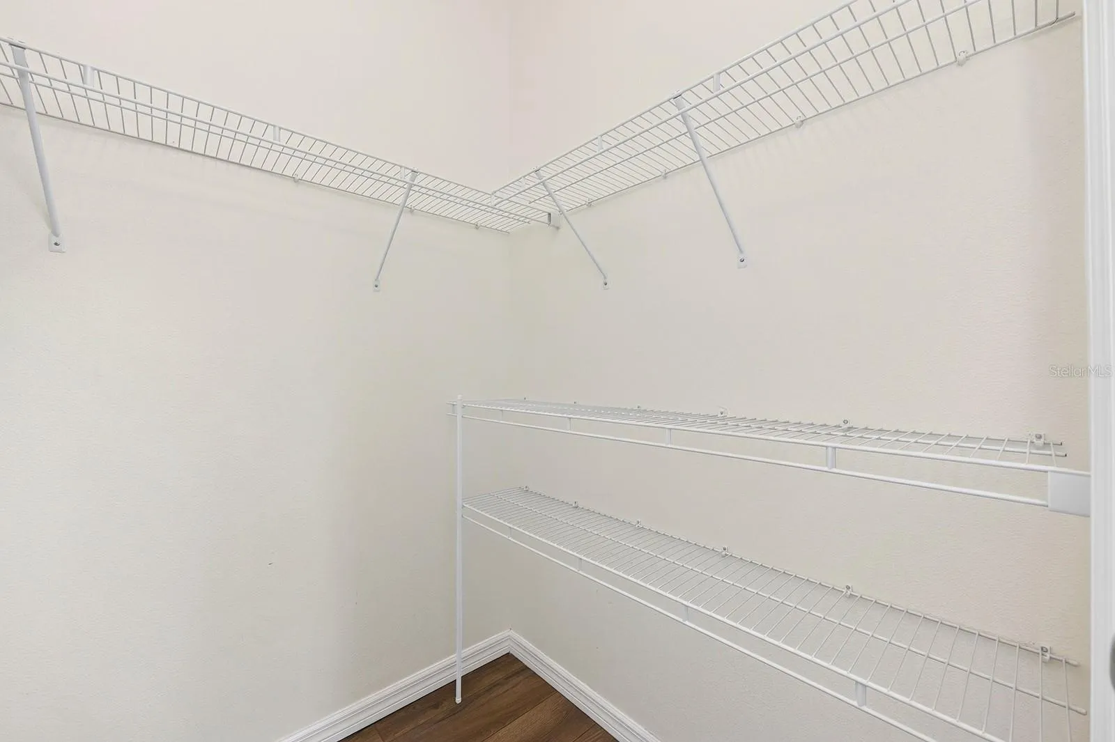 Primary suite walk-in closet.