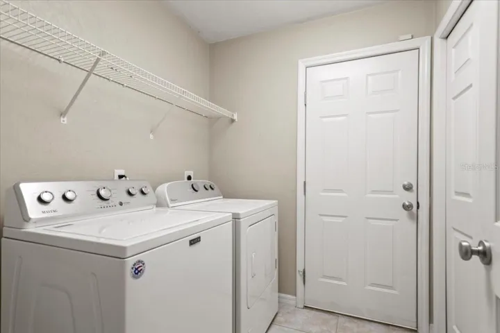 laundry room with garage access