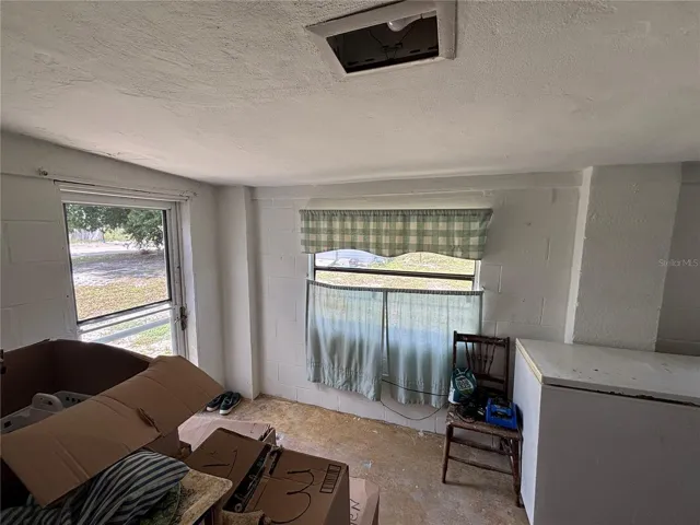 ENC BACK PORCH FOR UTILITY RM