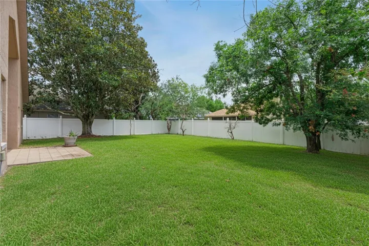 Large fenced corner lot