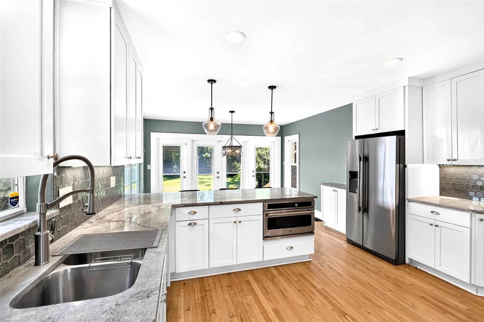 Kitchen has Hardwood Floors &amp; Wine Fridge