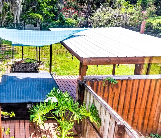 Hot Tub and Deck in Lush Side Yard