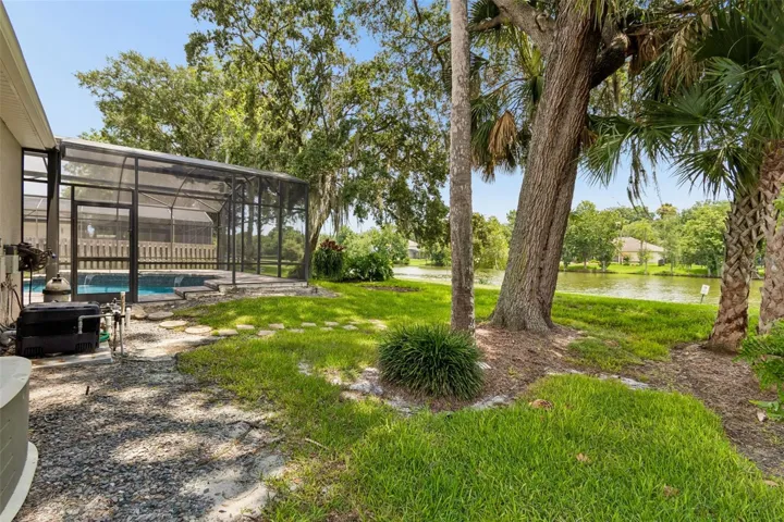 Pool pump and propane heater are located on the back of the home.  Leased above ground propane tank is on the rear right side of the home.