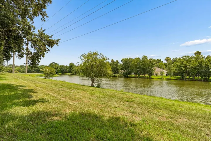 Grass adjacent to the water is maintained by the HOA