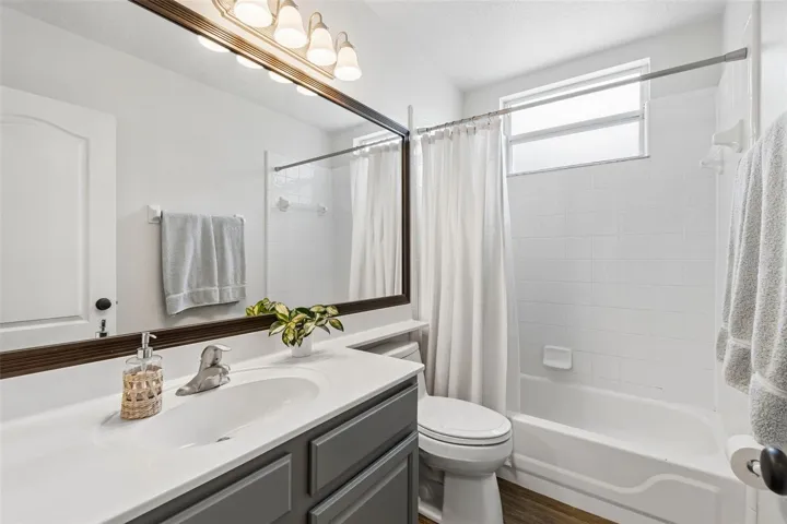 Bathroom 2 with tiled tub/shower