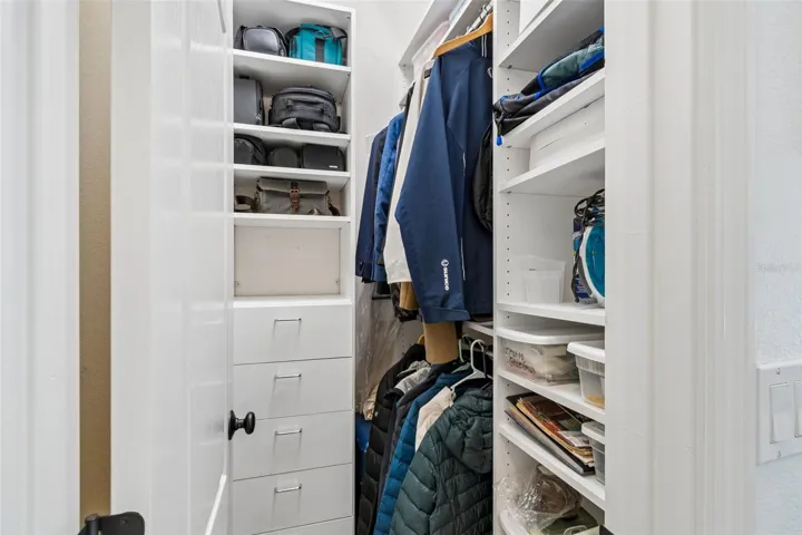 Walk-in primary closet 2