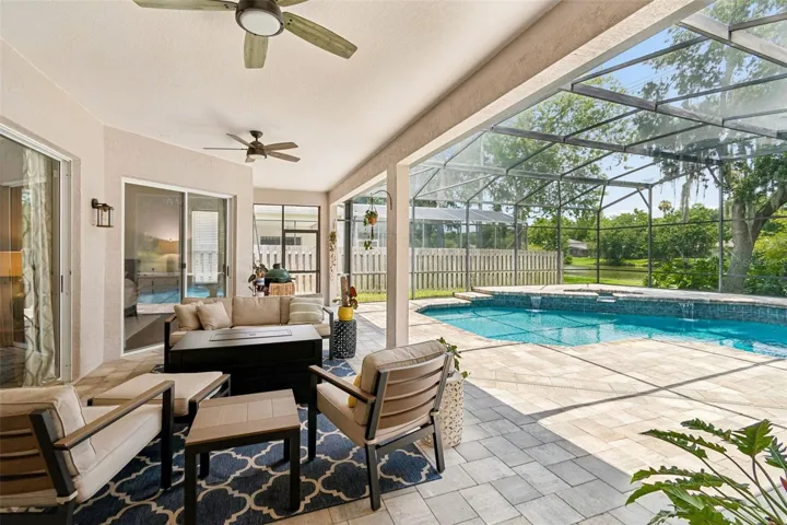 Large covered lanai with ceiling fans is a great spot to enjoy the Florida weather while staying out of the sun