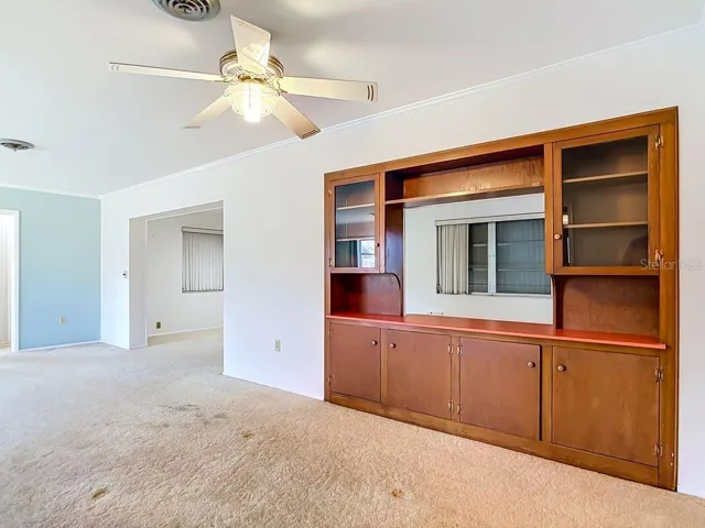 Dining Room w/built-in Storage and Serving Hatch.