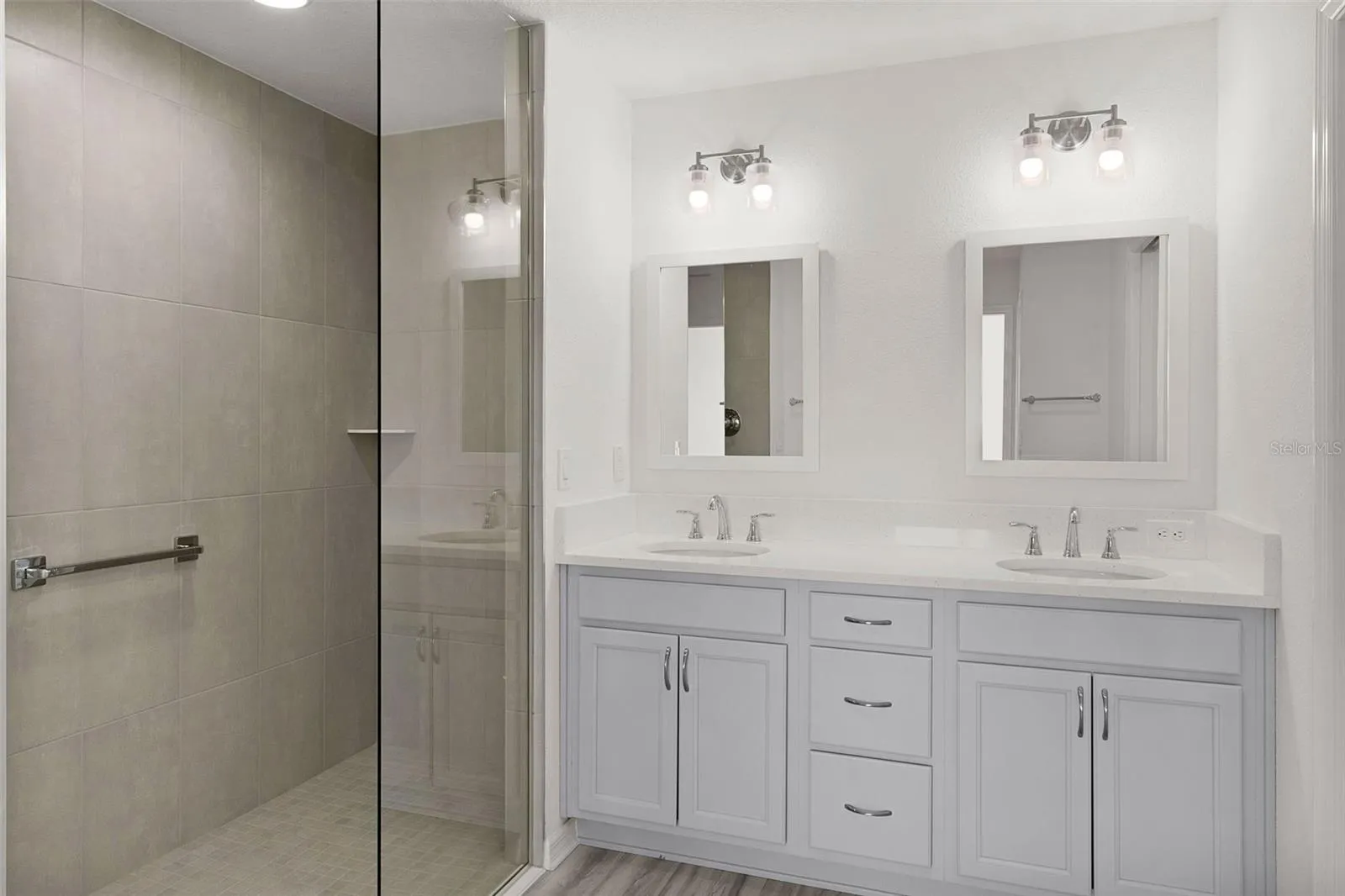 Double Vanity &amp; Tile Roman Shower with Glass