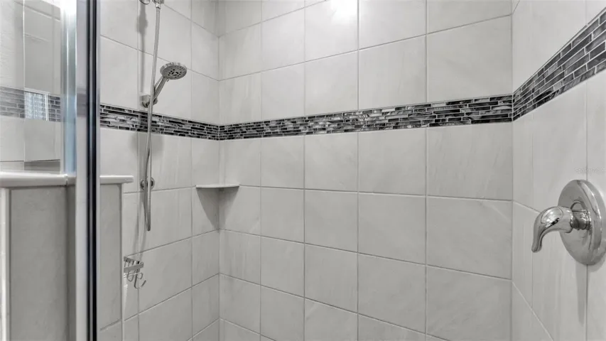 Primary Shower with tile and glass