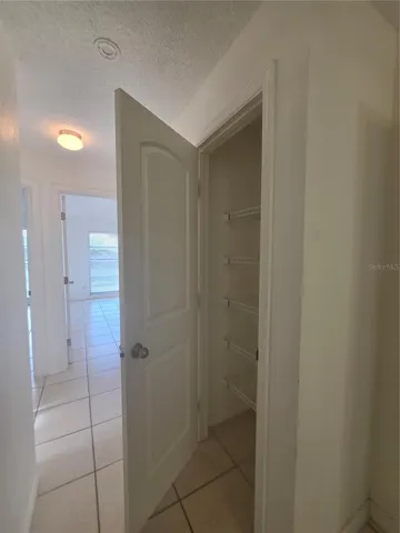 linen closet in the bedroom hallway