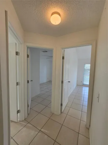 bedroom hallway fromt left to right (middle, rear, primary)