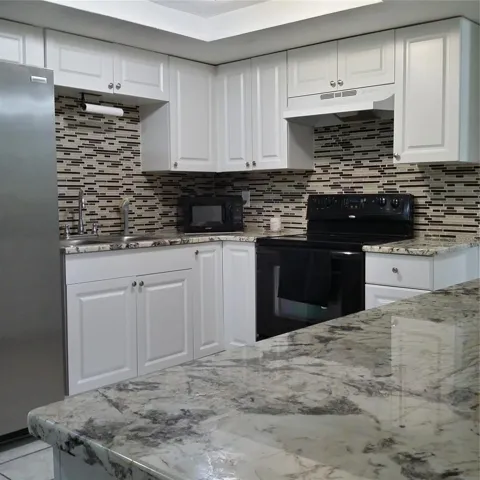 Hello Granite - This Island peek a boo to the living room is Everything!