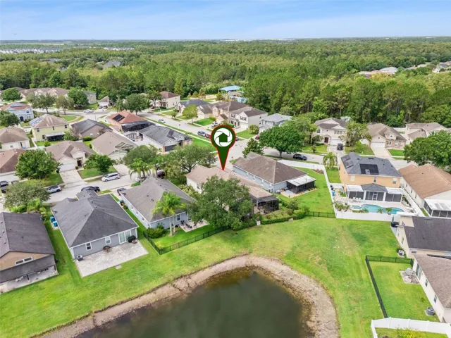 Rear aerial view & surrounding community