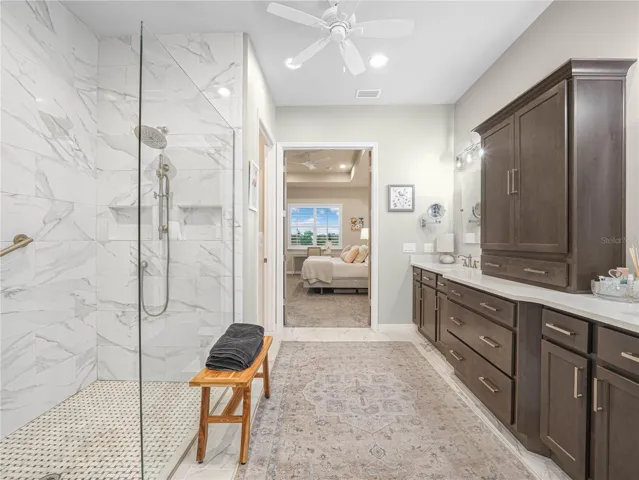 Walk In Shower with Floor to Ceiling Tile/Glass Enclosure