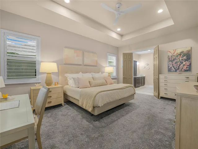Primary Suite with Trey Ceiling and Plantation Shutters