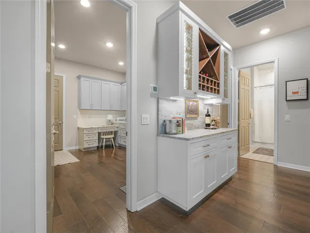 Dry Bar with Back Splash, Leathered Counter Top, Lighting and Wine Holder