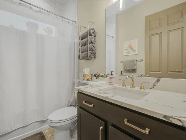 Guest Bath with Shower Tub Combo, Comfort Height Vanity and Accent Window Above Shower