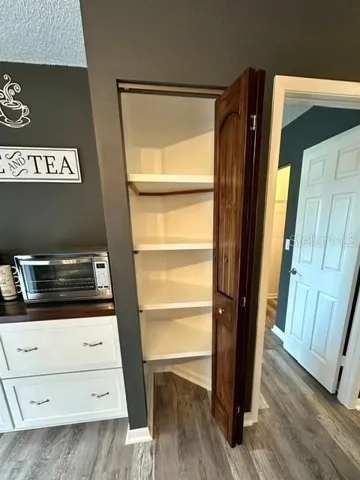 Closet Pantry with buil in shelving for extra storage room.