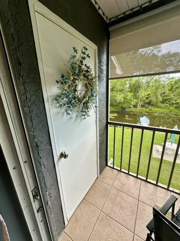 Screened in Balcony with Storage room