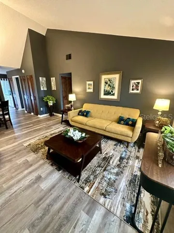 Enter through the front door to your beautiful light and bright living area with cathedral ceilings.